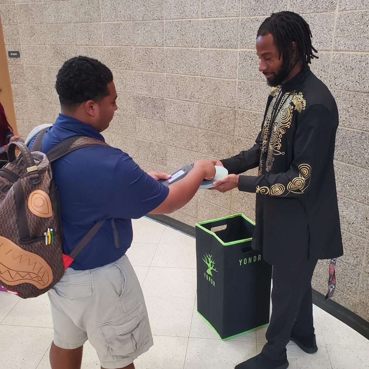 UA students are eager to unlock their Yondr pouches after school.  