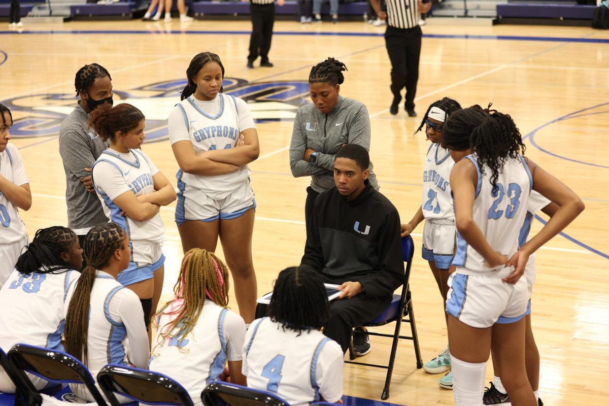 The Lady Gryphons' coaches help the team improve during games and practices