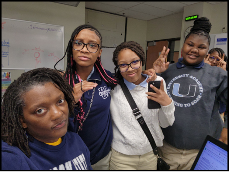 Ms. Farr stopped to smile with eighth graders Nylah Gregory, Caydence Shyne and Meihayah Sloan. 
