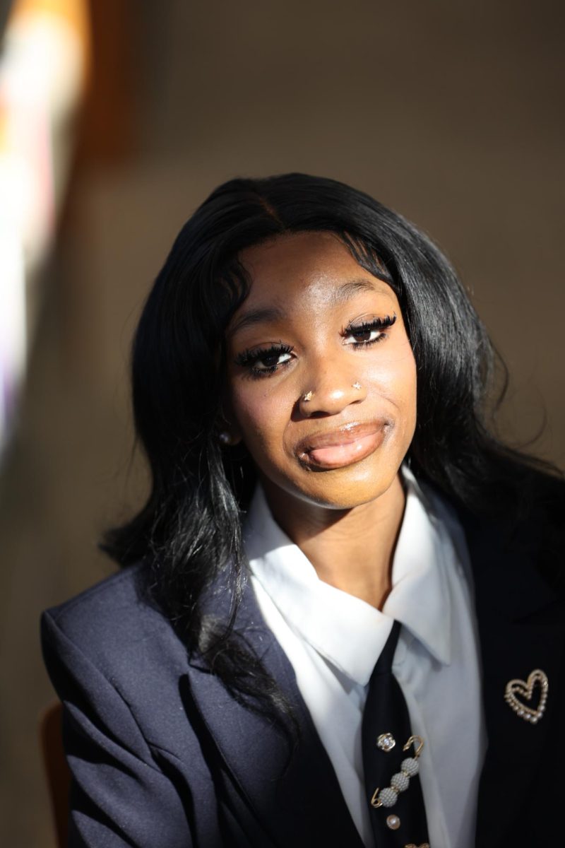 Makayla Dunn showed off her fashion for her senior "read picture," a tradition at University Academy.